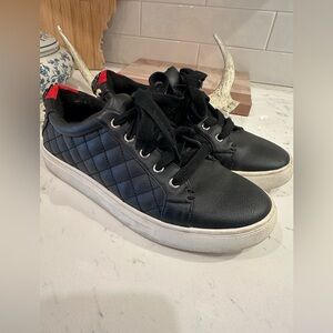 KURT GEIGER LONDON LUDO QUILTED STUDDED WITH ICONIC HEAD SNEAKERS in Black Red